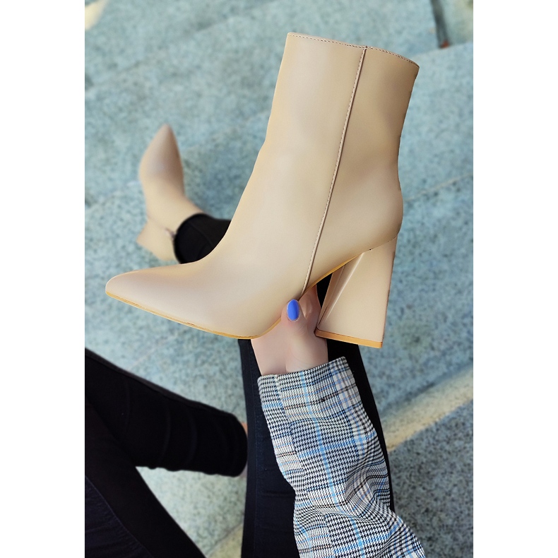 Beige ankle boots on a triangle-shaped post 2