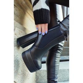 Black boots on a high post and platform 1