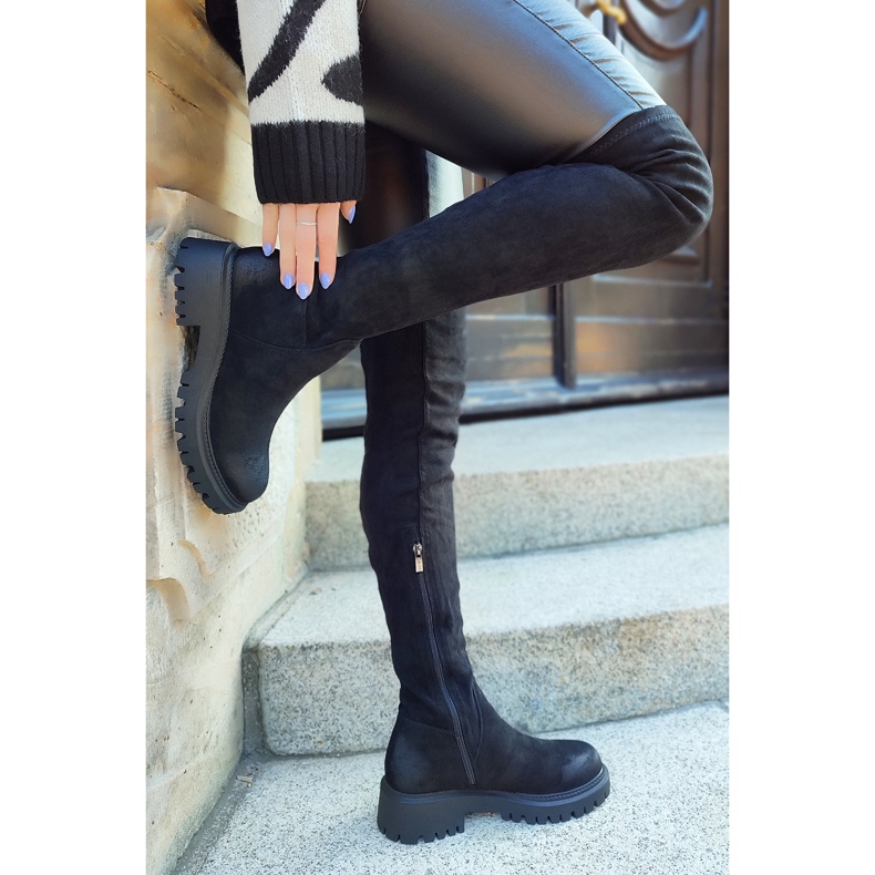 Black over-the-knee boots with an elastic upper 1