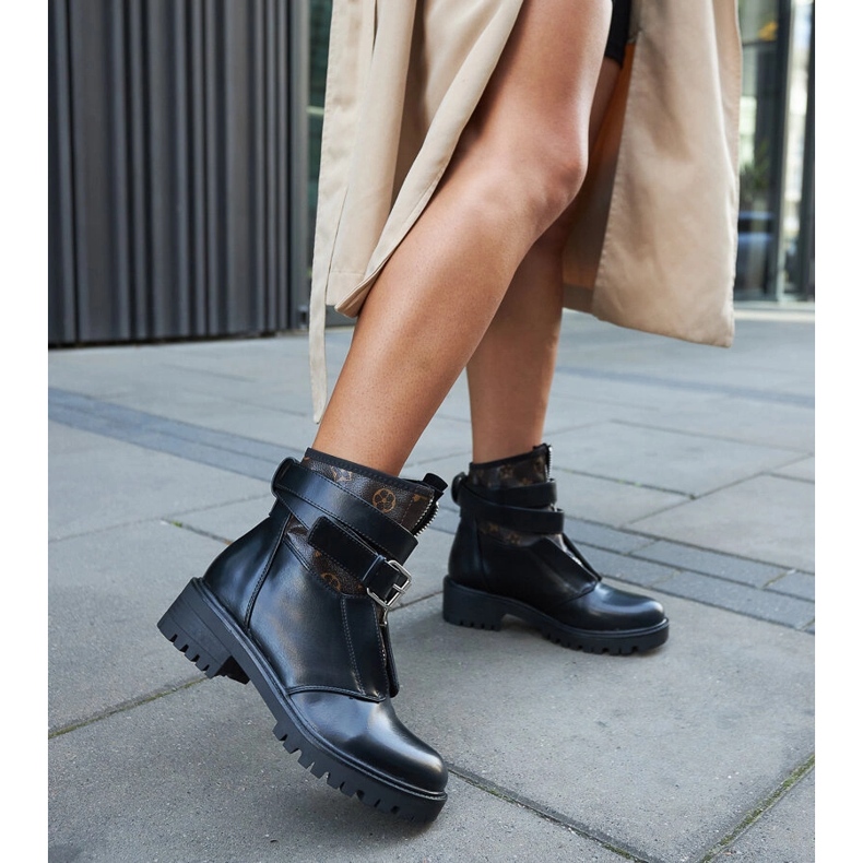 Black boots with a decorative Domus strap 2