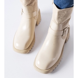 Beige ankle boots on a massive Castelvetrano heel 1 Beige ankle boots on a massive Castelvetrano heel 1
