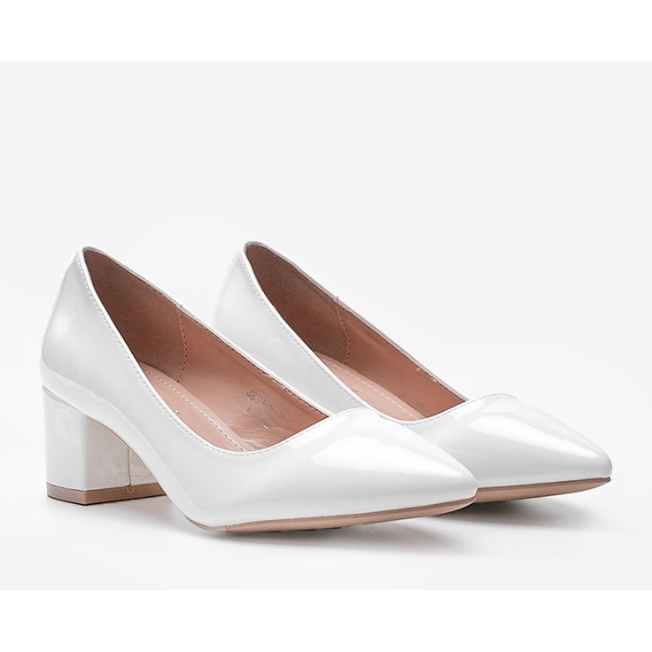 White pumps lacquered on the Eden block 1
