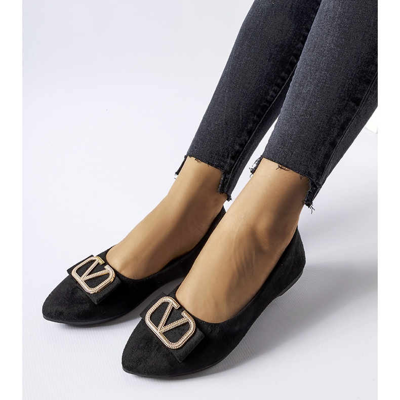 Black ballet flats with a decorative Secondo buckle 1