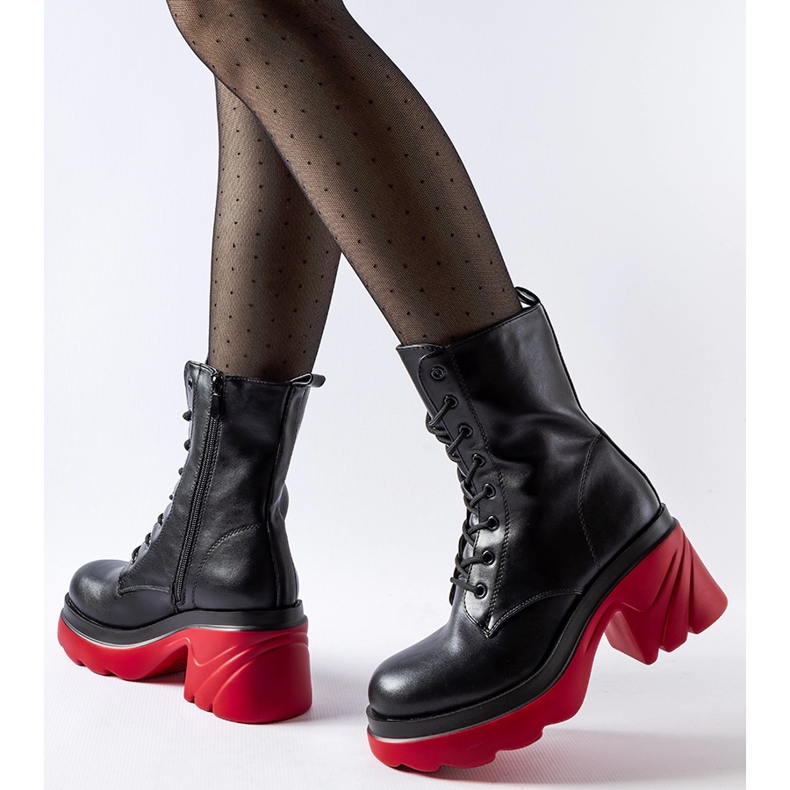 Black insulated shoes with a red heel Cost 1