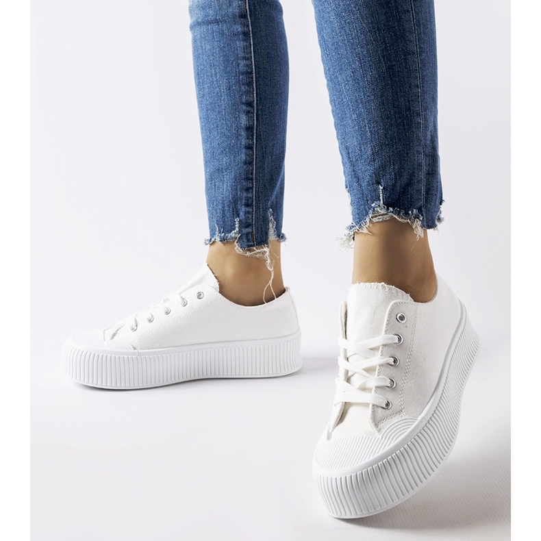 White sneakers on a thick Fortunata platform 1