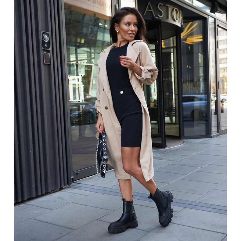 Black ankle boots with visible Moriano tread 1