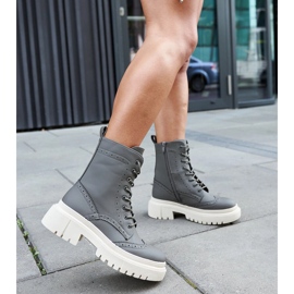 Green boots decorated with Nicla stitching 2