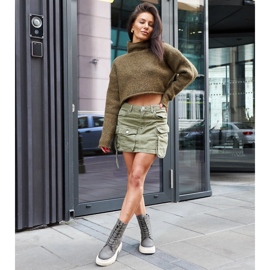 Green boots decorated with Nicla stitching 1