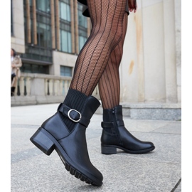 Black ankle boots with a decorative Archuleta buckle 2