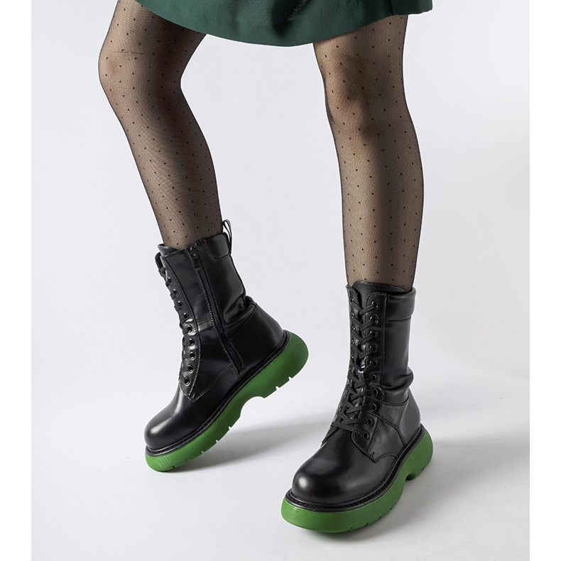 Black insulated boots with a green Beata sole 1