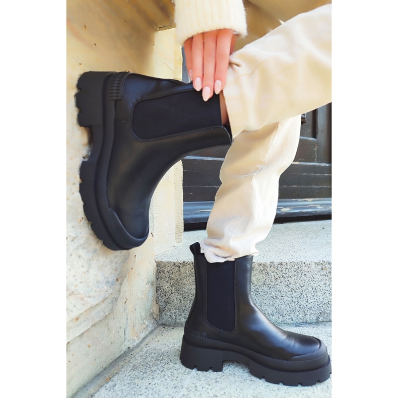 Ladies' black boots with a black sole 1