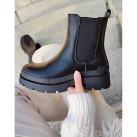 Ladies' black boots with a black sole 2