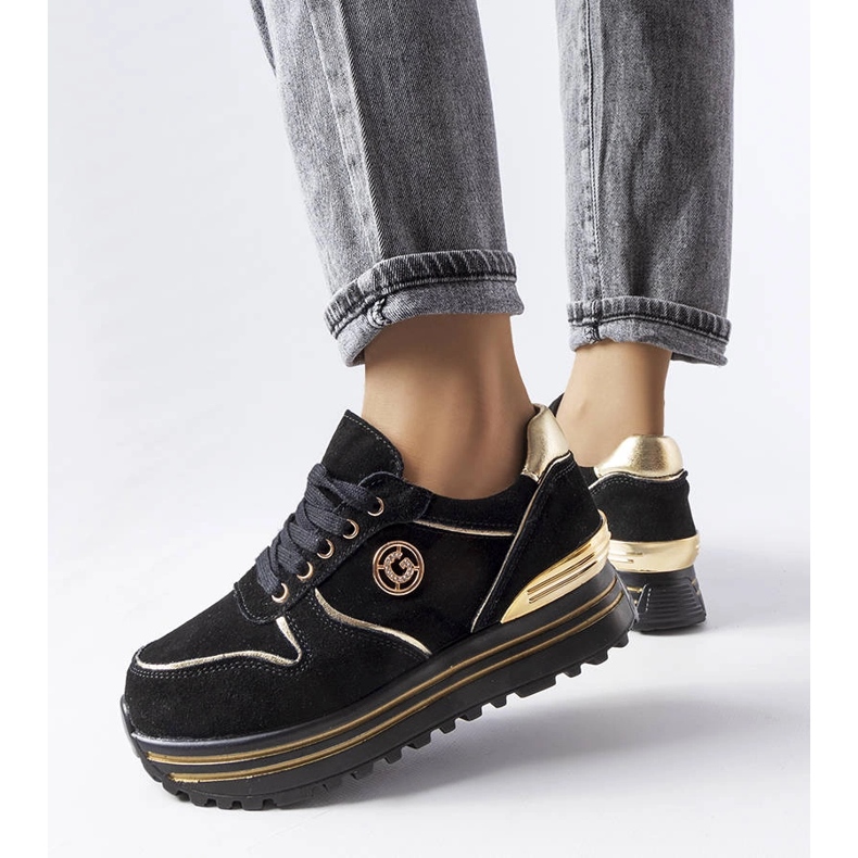 Black and gold platform sneakers from Therrien 1