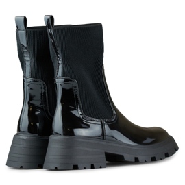 Black patent workers shoes with a flexible upper 1