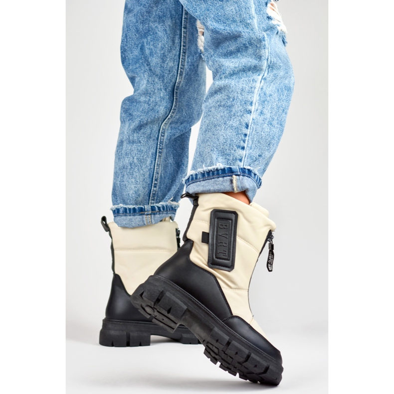 Women's beige snow boots with a black sole 2 Women's beige snow boots with a black sole 2