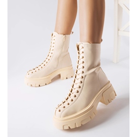 Beige insulated bovver boots decorated with Amla binding 1