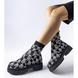 Black and white massive sock boots by Salomone 1