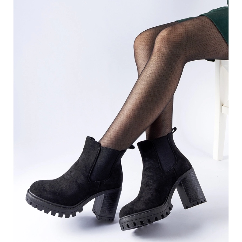 Black ankle boots on a massive Montelparo heel 1
