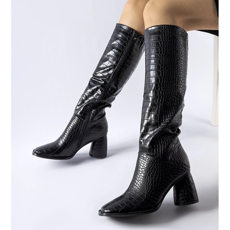 Black boots decorated with Council embossing 1