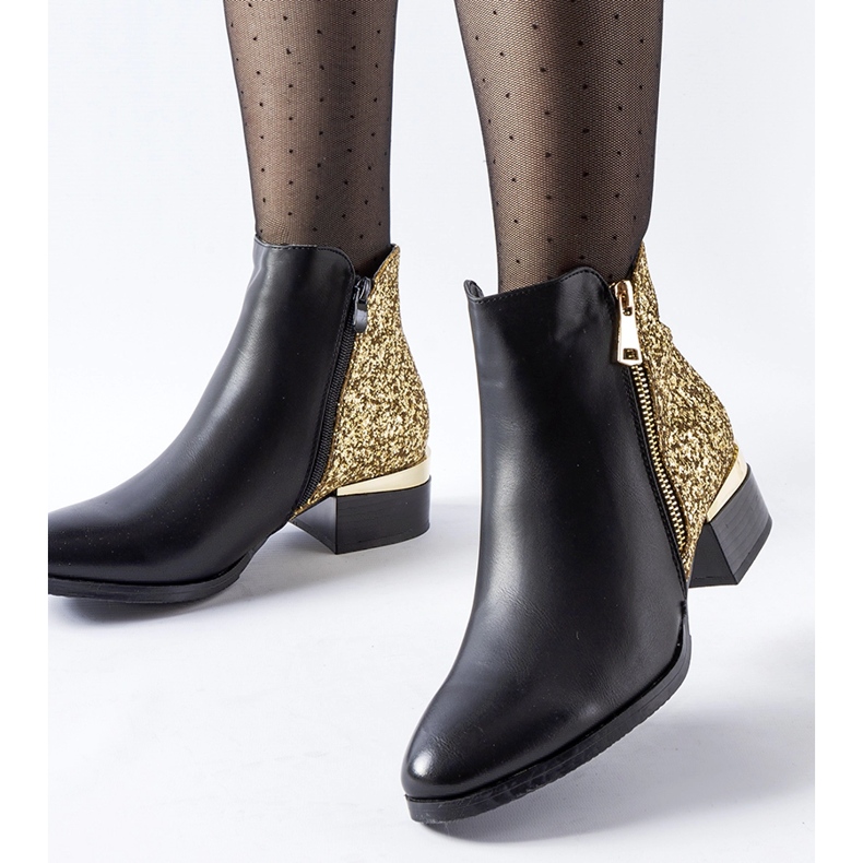 Black insulated ankle boots with a decorative back Olindo 1