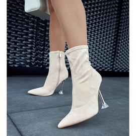 Beige ankle boots with a decorative heel from Ferguson 2