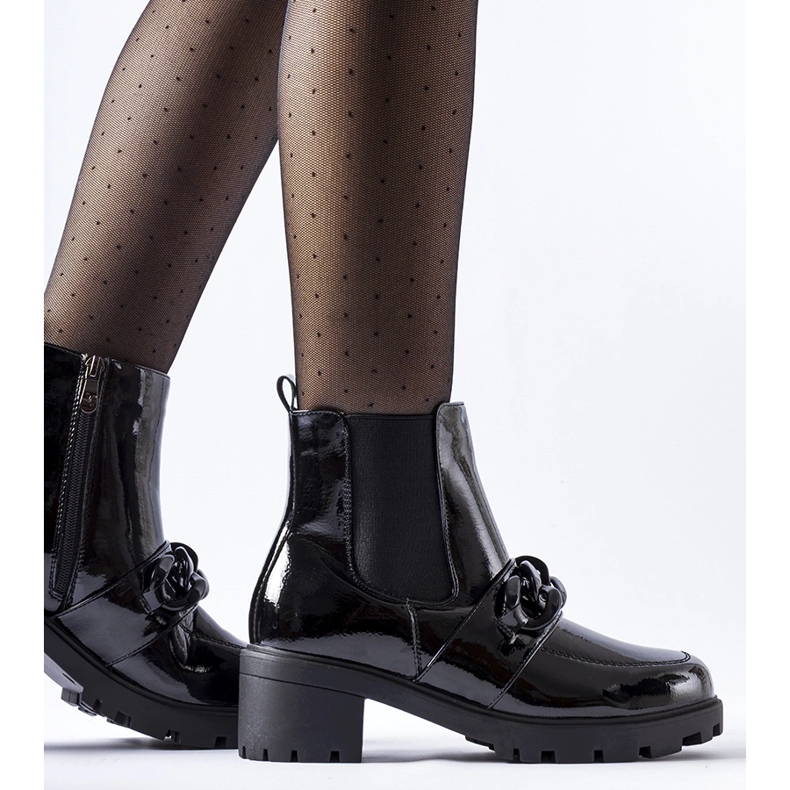 Black patent leather insulated ankle boots with a buckle 1 Black patent leather insulated ankle boots with a buckle 1
