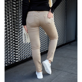 White leather sneakers on the platform 2