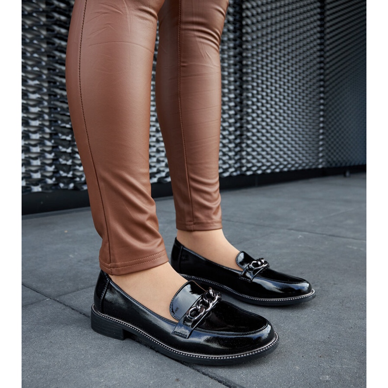 Black patent loafers with a buckle 1