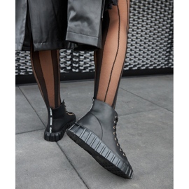 Carassai black long leather sneakers 1 Carassai black long leather sneakers 1