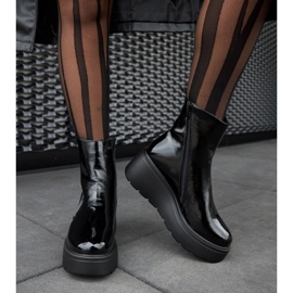 Black, insulated wedge boots 1