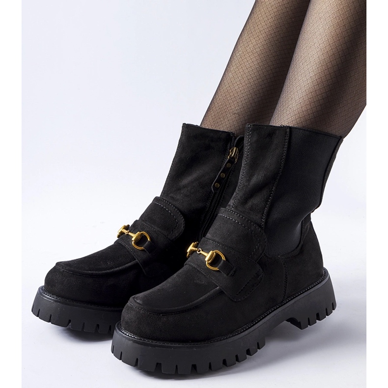 Black insulated boots with an Overlook buckle 1 Black insulated boots with an Overlook buckle 1