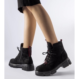Black ankle boots decorated with red Monrency trim 1