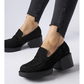 Black moccasins on an eco-suede block by Gaspare 1