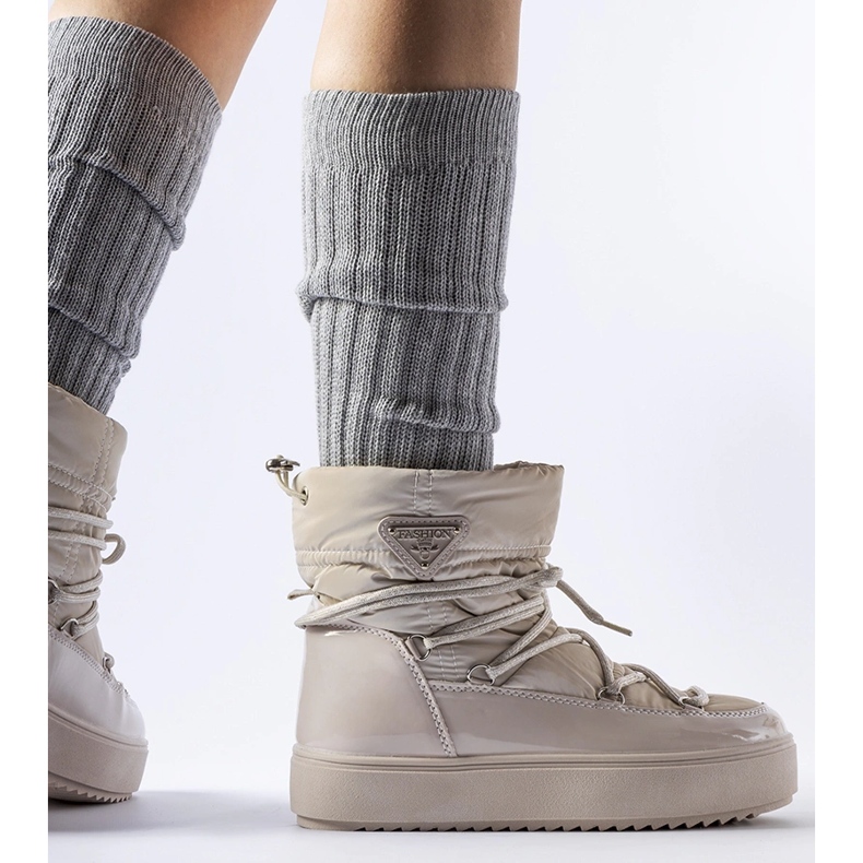 Beige patent snow boots with elastic band from Calogero 1