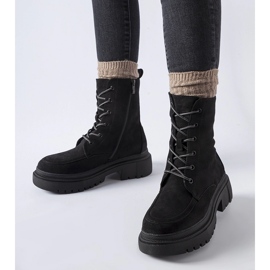 Black sneakers with a massive Riel sole 1