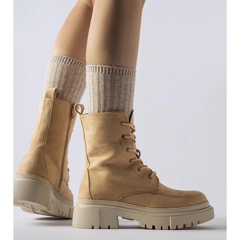 Brown boots with a massive Riel sole 1