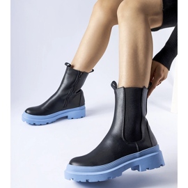 Georgette's black shoes with a blue sole 1