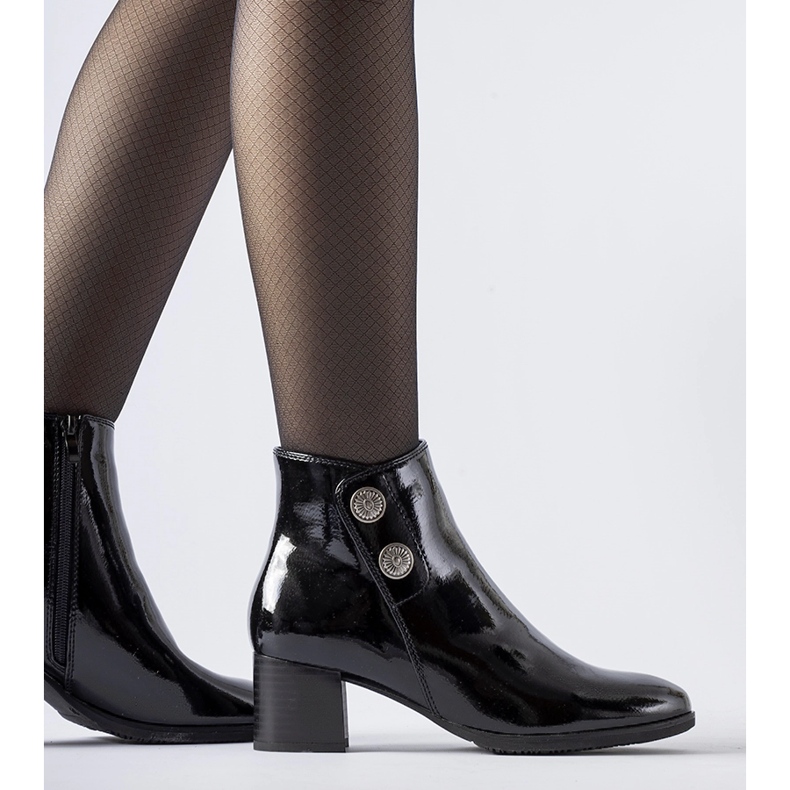 Black patent ankle boots with a low heel by Guido 2