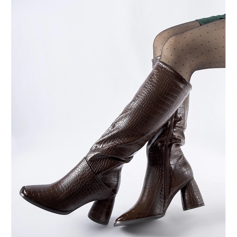 Brown boots decorated with Council embossing 1