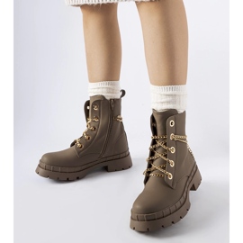Brown hiking boots with Alcin chain 1