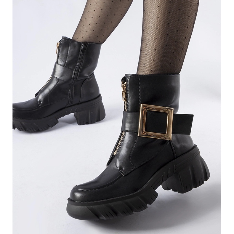 Black massive ankle boots with a Morgan buckle 1