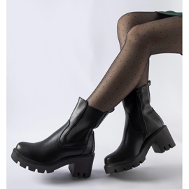 Black insulated boots with a Hattiesburg block 1