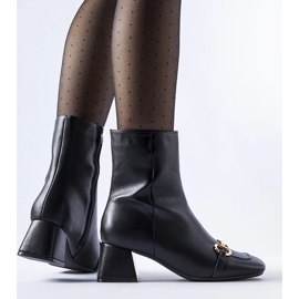 Black high-heeled ankle boots with a Prewitt buckle 1