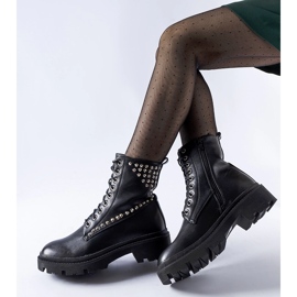 Black workers' boots decorated with Bobbitt studs 1