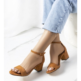 Brown sandals on the Deshe post 2