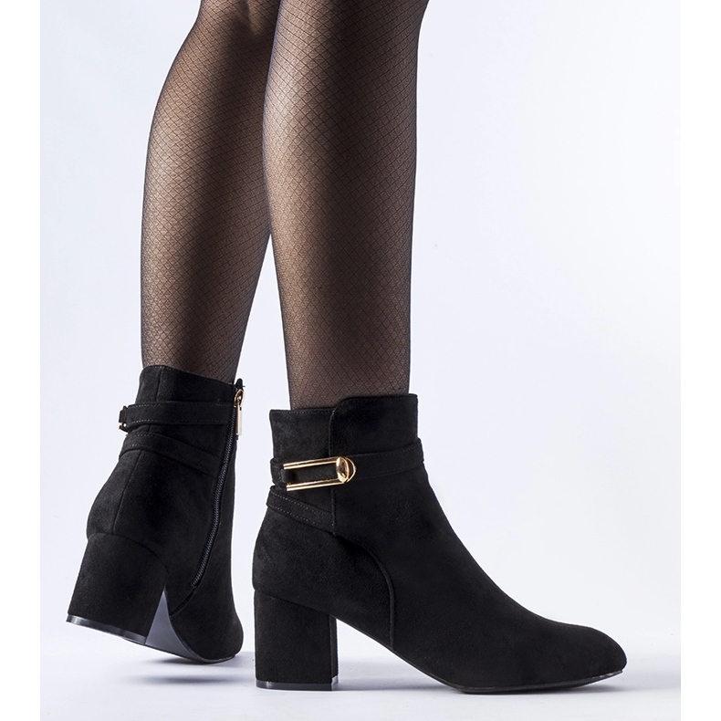 Black low-heeled ankle boots with a Sesto buckle 1