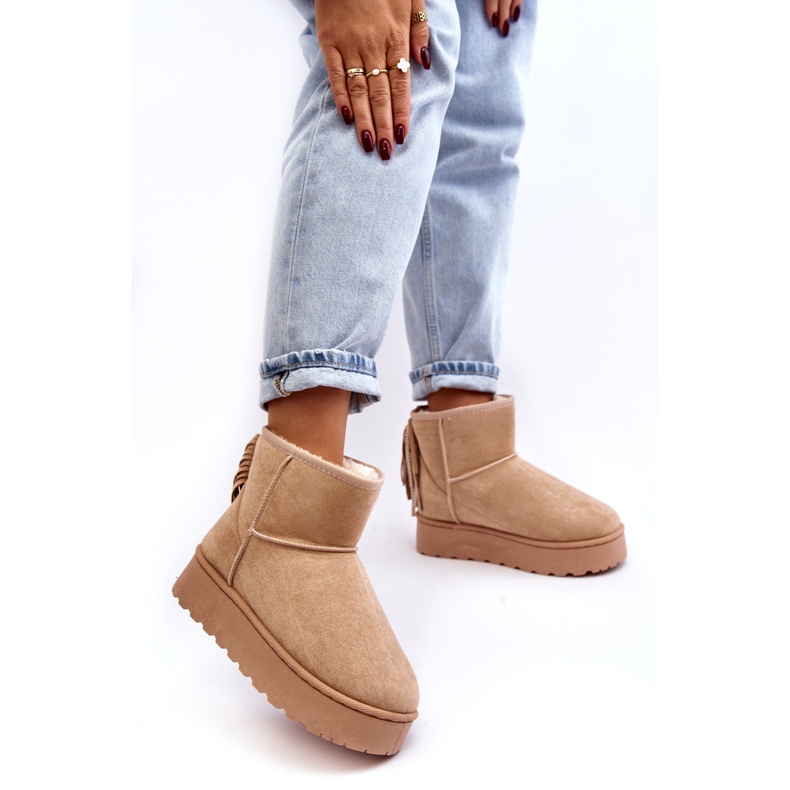 Women's snow boots on a massive platform with fringed beige 3