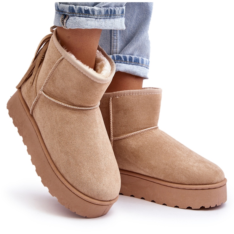 Women's snow boots on a massive platform with fringed beige 5
