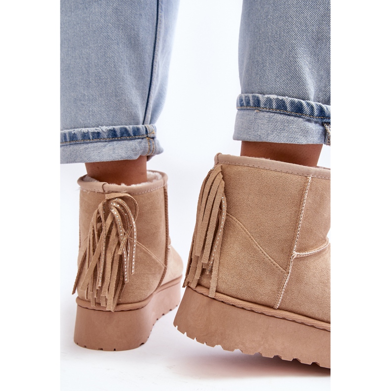 Women's snow boots on a massive platform with fringed beige 1
