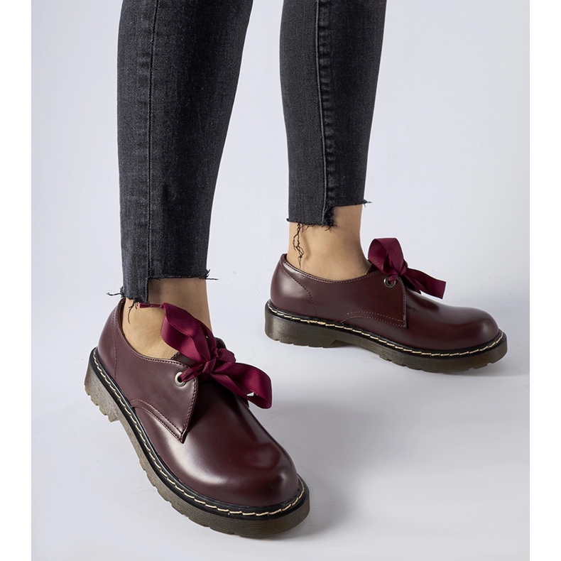 Maroon shoes with a decorative bow from Rodriguez red 1